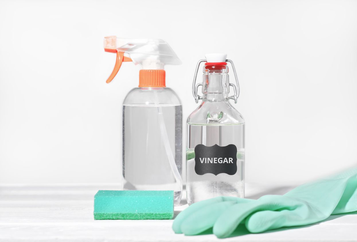 DIY glass cleaner made with vinegar, water, and cornstarch for streak-free windows and mirrors.